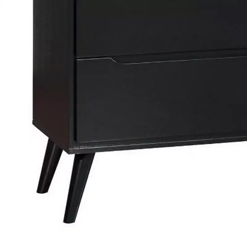 Commode à 4 tiroirs en bois avec pieds ronds fuselés, noire